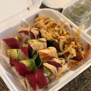 Tuna looks abnormally dark red....I'm not sure if I was served old fish dyed red or artificial fish.