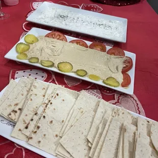 Cucumber yogurt, hummus, and the bread.