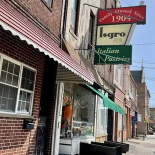 a brick building with awnings