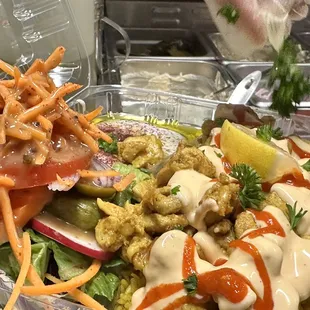 a salad in a plastic container