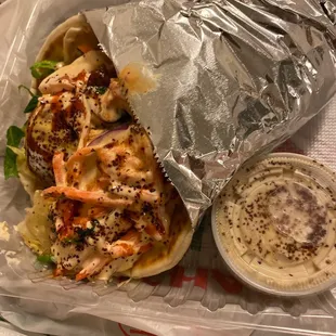 a sandwich and a side of dip