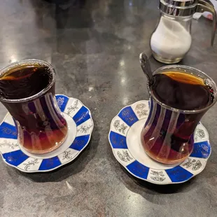 Tea prepared at your table in a very cool acrobatic way.