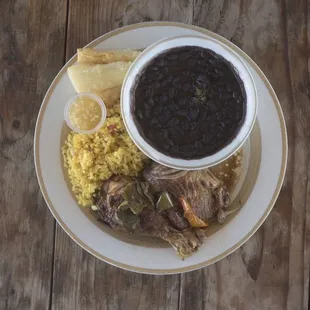 Cuban bowl  Pollo asado with cuban yellow rice, black beans and Yucca frita