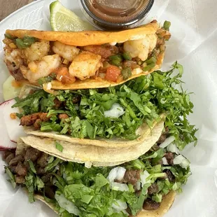 Tacos Cancun (spicy shrimp), chorizo, steak