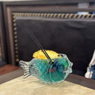 a fish shaped glass clock