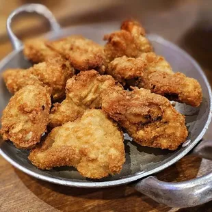 a plate of fried chicken nuggies