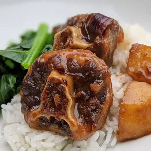 Oxtail Adobo, added rice and vegetables at home