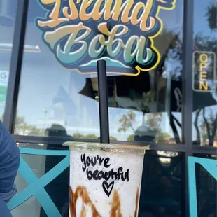 Horchata flavor w/ store logo in background