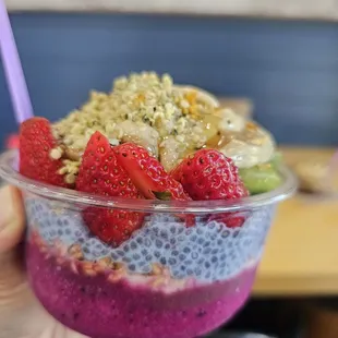 pitaya, mango and acai base, blue chia, hemp granola, all the fruits, 2 nut butters and bee pollen!