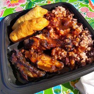 Jerk chicken plate with rice &amp; peas and festival