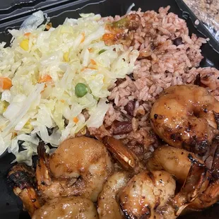 Jerk shrimp with rice and beans and steamed veggies