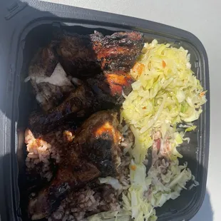 Jerk chicken, rice &amp; red beans. Steamed cabbage