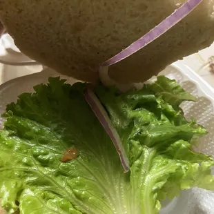 Salmon burger with pineapple and Cole slaw garlic sauce and mango chutney smfhhhhh horrible