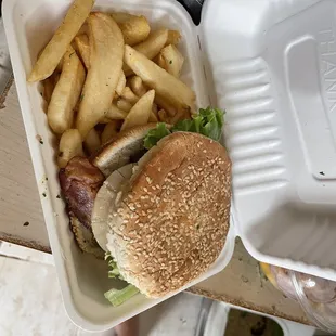 We forgot to mention even the pineapple needs work on the Island Burger. See how the cheap, small burger doesn't even fit the cold bun?