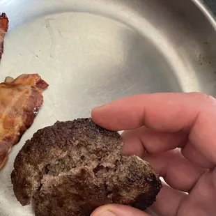 The ridiculously small burger patty ordered rare, came out well done and cold where it had to be heated at home.