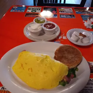 an omelet and a sandwich on a plate