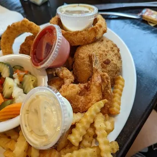 Fried Seafood platter. Two fish,two oysters,two shrimp,1 stuffed crab,onion rings... yeah...I was happy