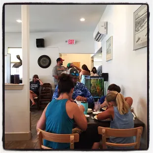 a group of people sitting at a table