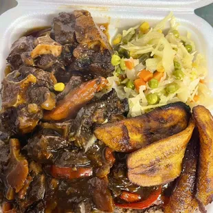 Oxtail with rice &amp; peas, steam cabbage &amp; fried plantain