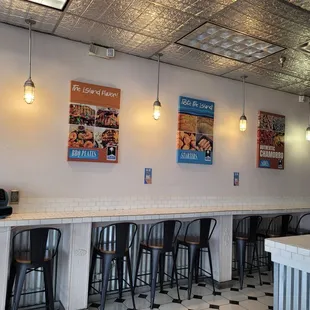 a row of bar stools in a restaurant