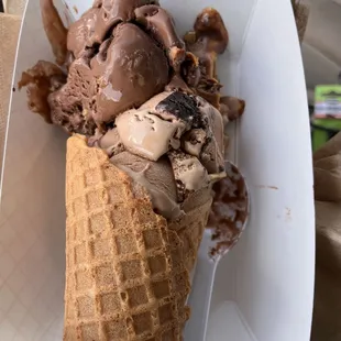 Chocolate Peanut Butter and Java Jolt in a waffle cone