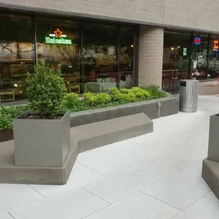 planters in front of a restaurant