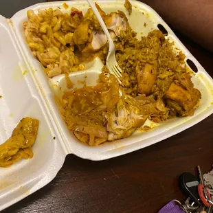 a plate of chicken and rice