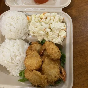 $12.99 about a little higher then $13 coconut shrimp (medium sized shrimp) and no choice of rice just white only .9/22/22 Thursday