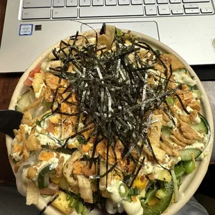 1 scoop spicy ahi, salmon, and chicken with basically all the toppings