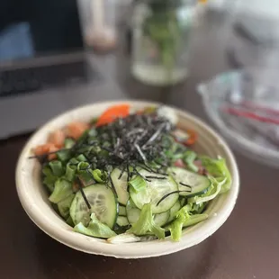 I built my own signature bowl with 3 proteins. Spring mix base, tune, salmon and octopus with ponzu drizzle. The pickled OG veggies are BOMB