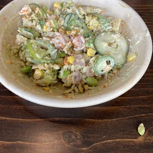 Customer bowl with double protein (half eaten)