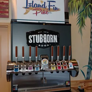 a beer dispenser at a bar