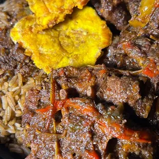 Haitian Oxtails, Diri Djon Djon (Black Rice), and Banan Peze (Plantain)