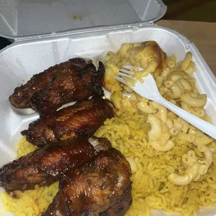chicken, macaroni and cheese in a styrofoam container