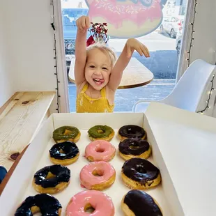 Excited for tasty donuts, especially her fave guava flavor!