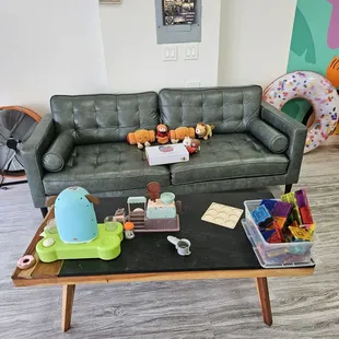 Comfy sofa and play area!!! We made new friends with the fellow plushies!