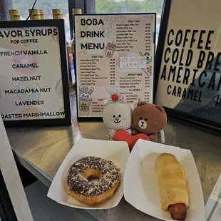 Chocolate macadamia nut donut and Hot dog in a blanket