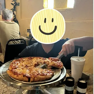 Delicious pizza. Smallest size offered on menu was   enough for two kiddos.