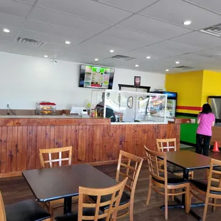 a woman standing at the counter