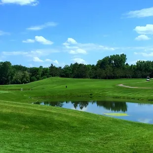A picture of one of our picturesque ponds decorating our fairways.