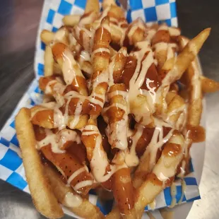 Island Fries: Crispy French Fries drizzled with house made bbq sauce and our signature island sauce