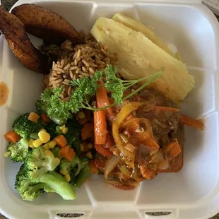 a meal in a styrofoam container