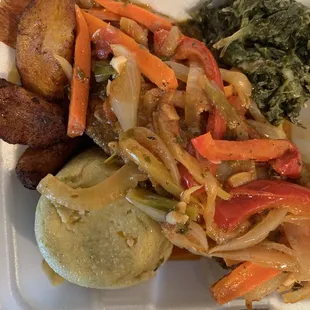 a styrofoam container of food