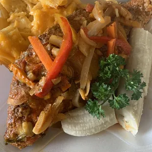 a variety of foods in a styrofoam container