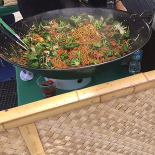 Soba noodles, fresh veggies &amp; a tasty sauce cooked in a wok front &amp; center!