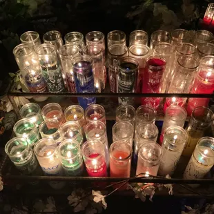 Candle altar outside the store.