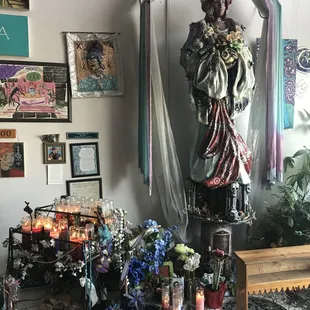 altar for Marie Laveau right outside the store. Remember, it's in a co-op!