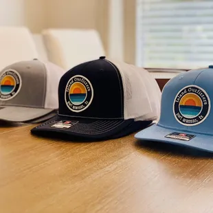 Island Outfitters trucker caps now available!