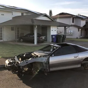 Nothing like a bunch of car hulks sitting out in the street for the kids to play on. Stay classy Island Palms.