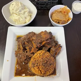 Oxtail Stew with rice &amp; peas Sides of cabbage &amp; potato salad